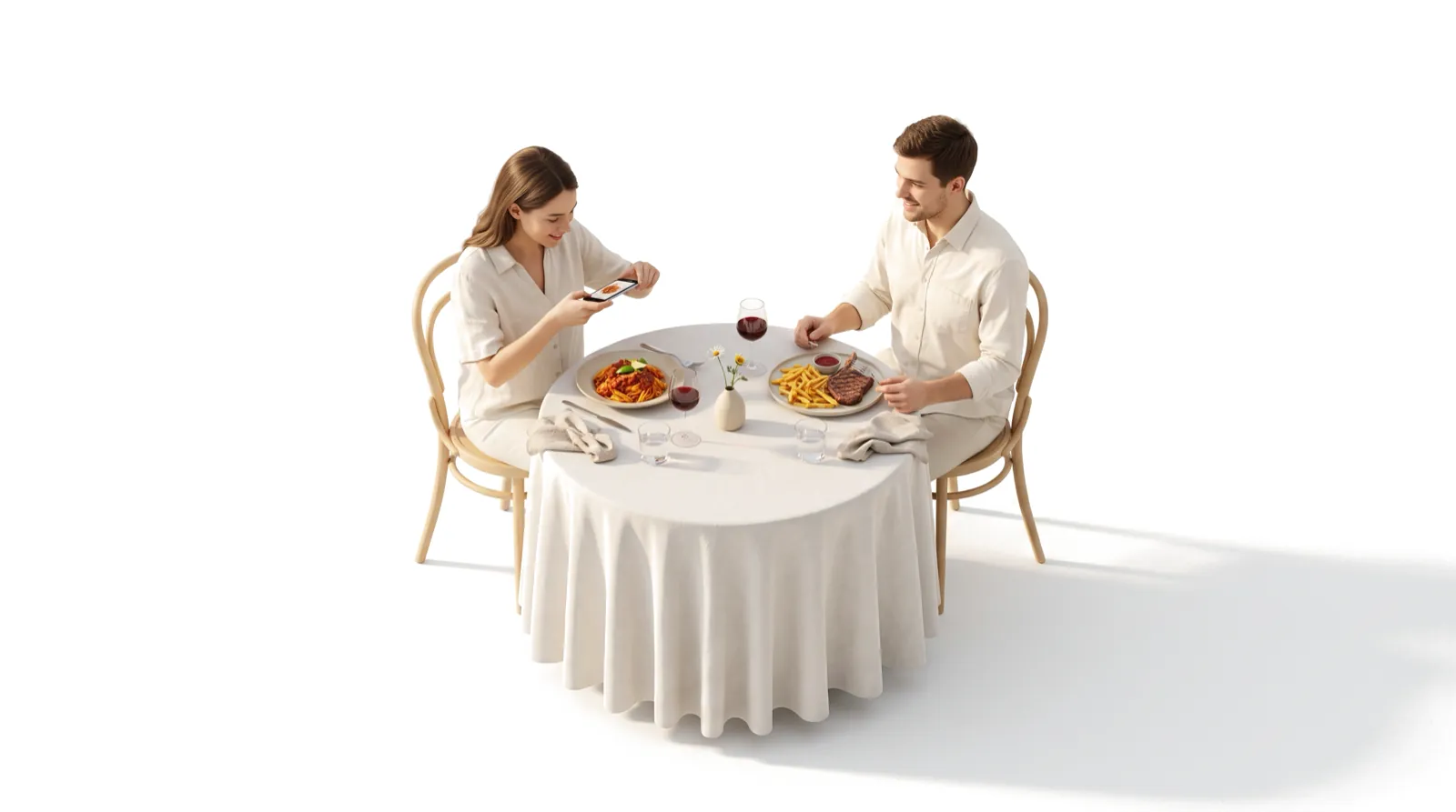 A couple eating dinner at a restaurant table, one photographing their plate
